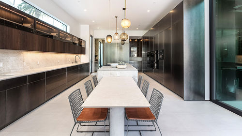 Contemporary kitchen - 202004 - TM Italia - oak / smoked glass / marble