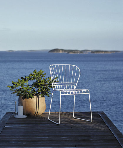 Contemporary garden chair - RESÖ - Skargaarden - steel / sled base / home