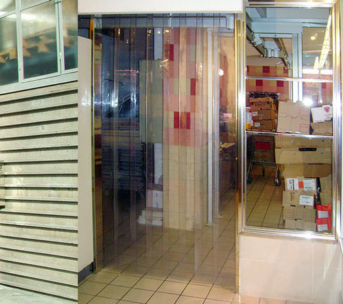 Flexible strip industrial door - KOPRON - PVC / thermally-insulated / for hangar