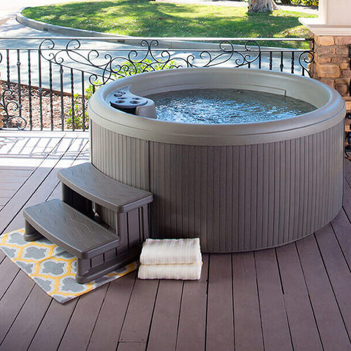 Above-ground hot tub - APTOS™ PREMIER - HotSpring® Spas - round / 5-person / acrylic