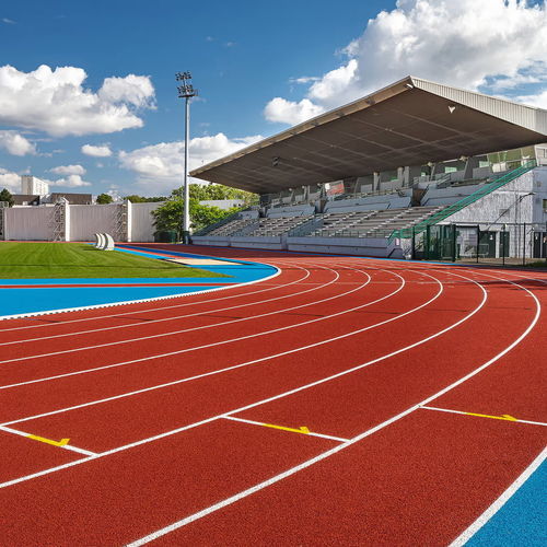 Outdoor sports flooring - TARTAN GOLD - Polytan GmbH - PU / polyurethane / for sports facility