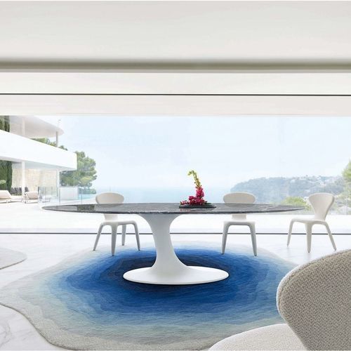 Contemporary dining table - SPEED UP - ROCHE BOBOIS - marble / polyester base / oval
