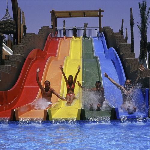 Upright slide - SPEED RACER - Van Egdom - curved / for water park / multiple
