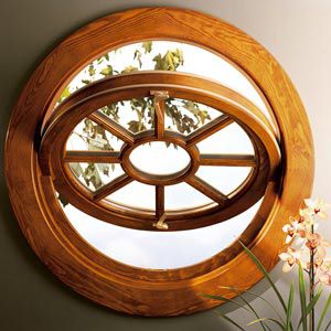 Wooden window - MARVIN - aluminum / pivoting / double-glazed