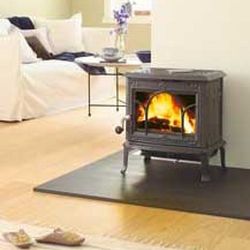 Wood heating stove - F 100 - Jøtul - 5 kW...10 kW / traditional / cast iron