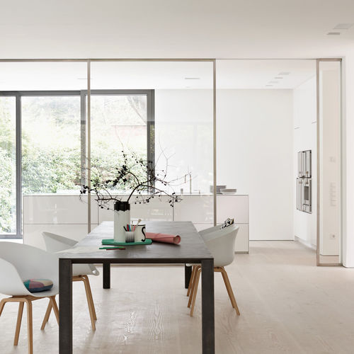 Contemporary kitchen - Villa Hamburg - eggersmann küchen GmbH & Co. KG - Corian® / island / handleless