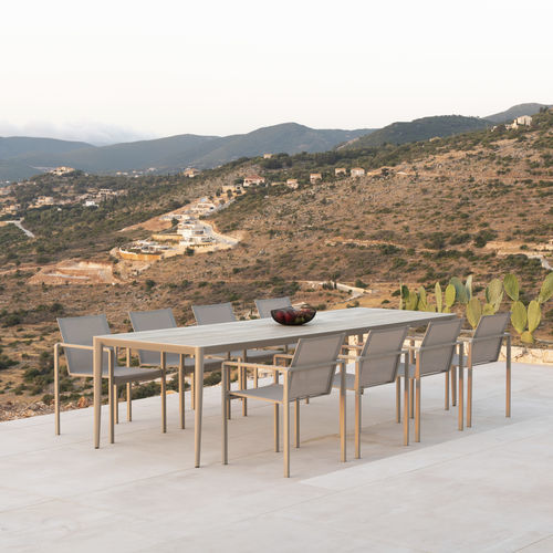 Contemporary dining table - U-NITE - Royal Botania - ceramic / marble / teak base
