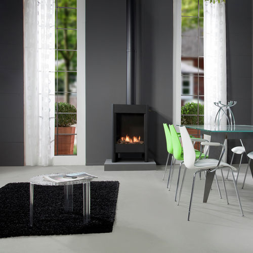 Gas heating stove - FARUM - Faber - 4 kW / multi-fuel / free-standing