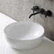 countertop washbasin / ceramic / round / without hole