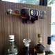 aluminum bottle holder / wall-mounted / commercial / LED