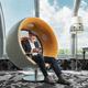 sound armchair / contemporary / leather / stainless steel