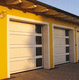 sectional garage door / aluminum / glass / automatic
