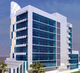 stick system curtain wall / insulated glass panel / aluminum and glass / high-resistance