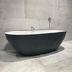 oval bathtub / free-standing / composite / contemporary
