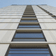 louvered solar shading / glass / window / vertical