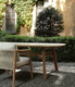 contemporary dining table / ceramic / teak base / curved