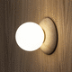 contemporary wall light / indoor / brass / glass