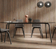 contemporary table / tempered glass / ceramic / powder-coated steel base