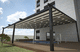 wall-mounted pergola / aluminum / steel / with mobile slats