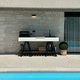 small kitchenette / in WPC / stainless steel / concrete