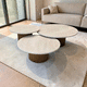 contemporary nesting tables / travertine / wooden base / round