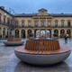 contemporary public bench / painted steel / concrete / wooden