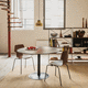 contemporary table / HPL / metal base / round