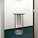 contemporary table / polished stainless steel / round / with built-in ashtray