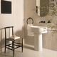 free-standing washbasin / ceramic / oval / without hole