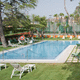 wall swimming pool / overflow / prefab / outdoor