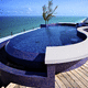 infinity swimming pool / custom / outdoor / semi-inground