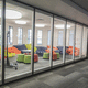 sliding and stacking partition / folding / double-glazed / aluminum