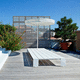 contemporary garden bench / painted steel / extruded aluminum / without backrest