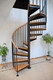 spiral staircase / contemporary / stainless steel frame / wooden steps