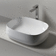 countertop washbasin / ceramic / oval / without hole
