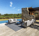 contemporary sofa / outdoor / fabric / with armrests