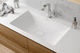 built-in washbasin / Corian® / with counter / with mixer tap