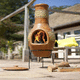 wood-burning fireplace / floor-mounted / Single-sided / garden