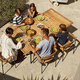contemporary dining table / teak / powder-coated steel base / rectangular