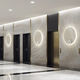 contemporary wall light / indoor / aluminum / round