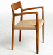 Scandinavian design chair / indoor / oak / walnut base
