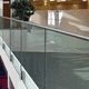 railing on slab front / glass / stainless steel / glass panel