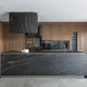 contemporary kitchen / walnut / glass / sandstone