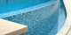 outdoor mosaic tile / pool / floor / natural stone
