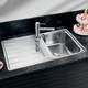 single-bowl kitchen sink / with drainboard / brushed stainless steel / overmount