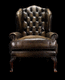 Chesterfield armchair / wool / leather / wing