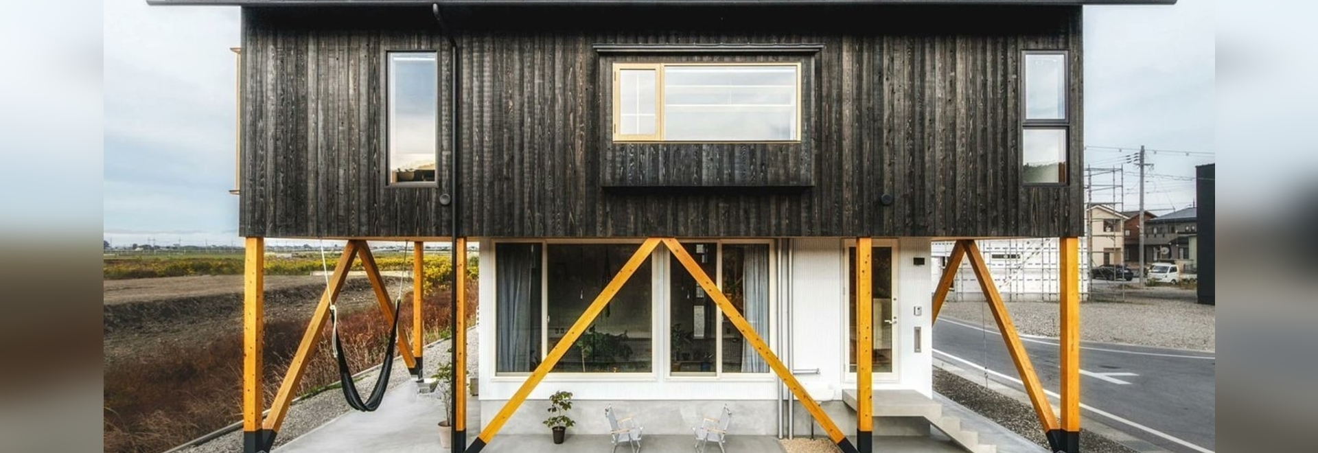 Ushijima Architects designs flood-resilient U-House near Japanese lake