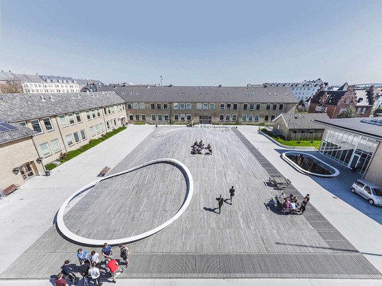 BIG ADDS SUNKEN SPORTS HALL AND GREEN-ROOFED ARTS BUILDING TO GAMMEL HELLERUP HIGH SCHOOL