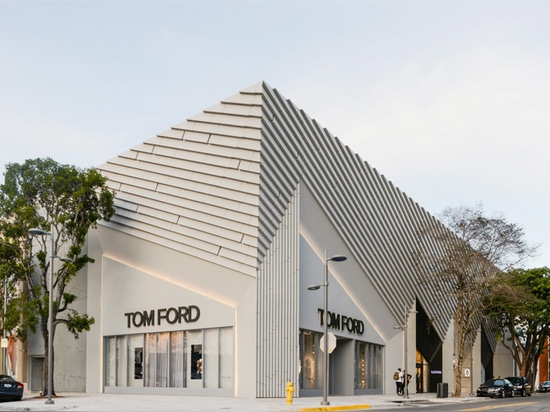 the design incorporates geometric motifs, standing as a bold presence as part of the existing streetscape