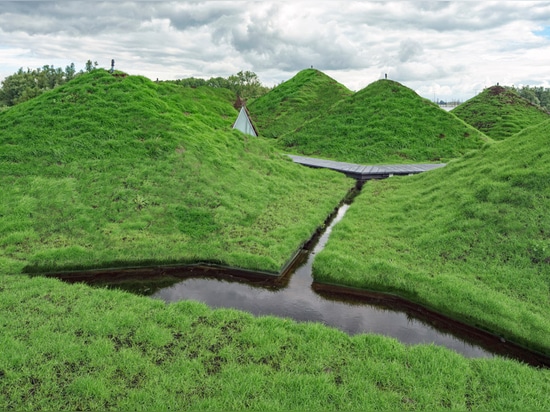 Studio Marco Vermeulen adds grass blanket over rooftop pyramids of Dutch island museum